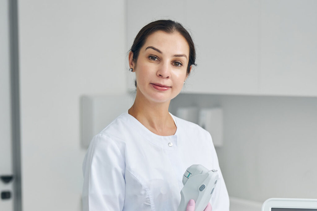 relaxed cosmetologist ready for treating her patie 972WAYB